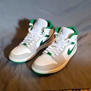 Green and white Jordan one mids